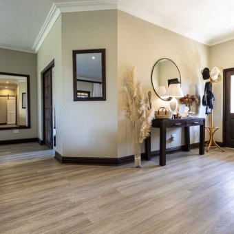 Blue qurtz vinyl floor in an entrance hall